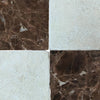 Four square marble tiles from Checkerboard Emperador Dark Marble and Crema Marfil Tumbled Set