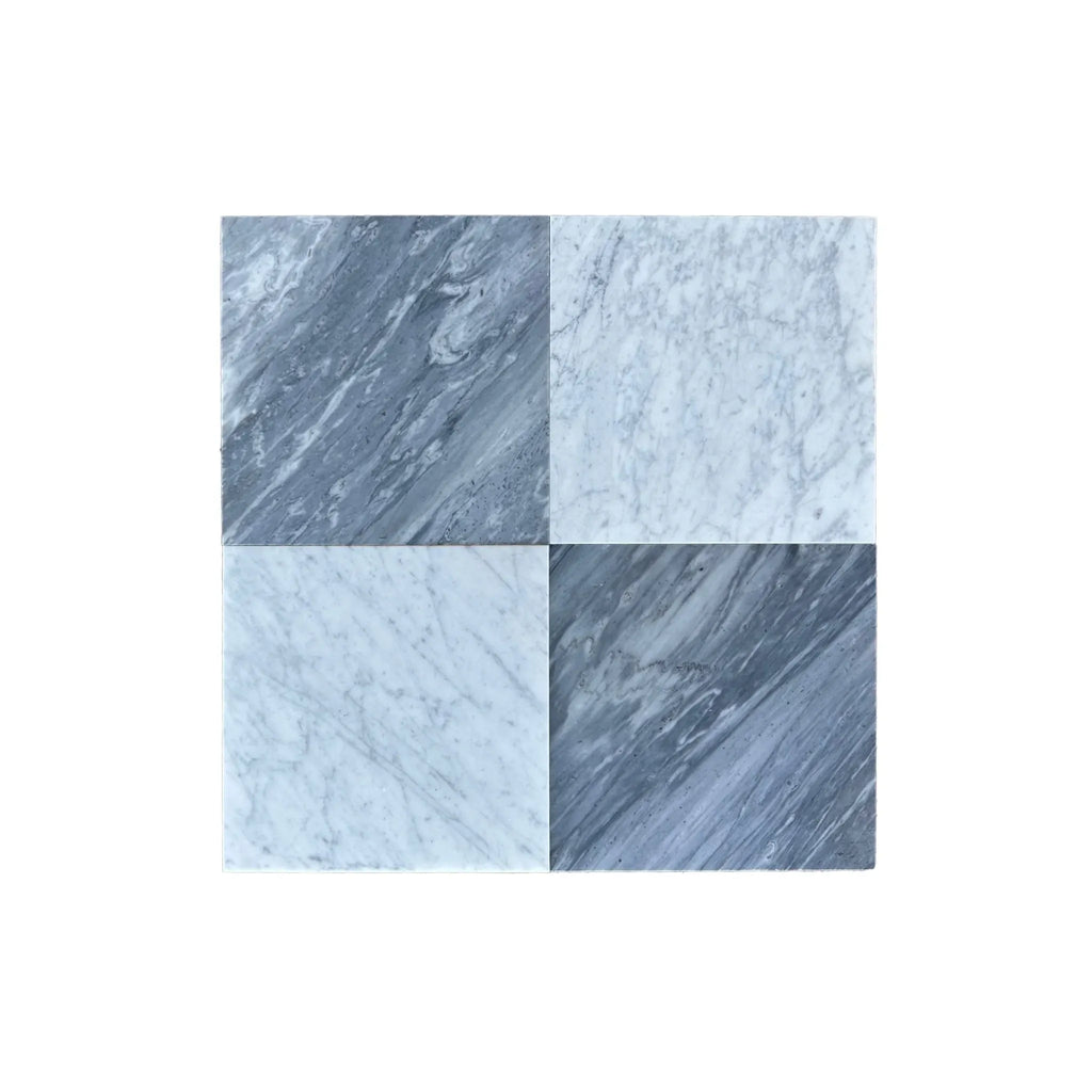 Four marble tiles from the Checkerboard Emperador Dark Marble and Crema Marfil Tumbled Set