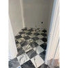 Black and white checkered marble floor featuring Checkerboard Nero Marquina and Arabescato Corchia