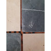 Tiled floor with alternating colors of Checkerboard Nero Marquina Marble and Ivory Travertine