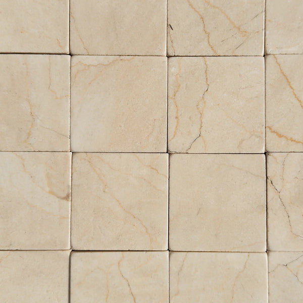 Beige marble tile pattern of Crema Marfil 3X3 Tumbled suitable for elegant interiors