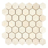 Beige hexagonal tile mosaic of Crema Marfil Marble 2 inch Tumbled Hexagon Mosaic