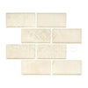 Rectangular, off-white beveled tiles from Crema Marfil Marble 2X4 Deep-Beveled Mosaic