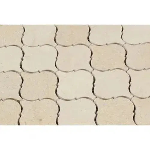 Interlocking beige paving stones in Crema Marfil Marble 3 inch Lantern Mosaic design