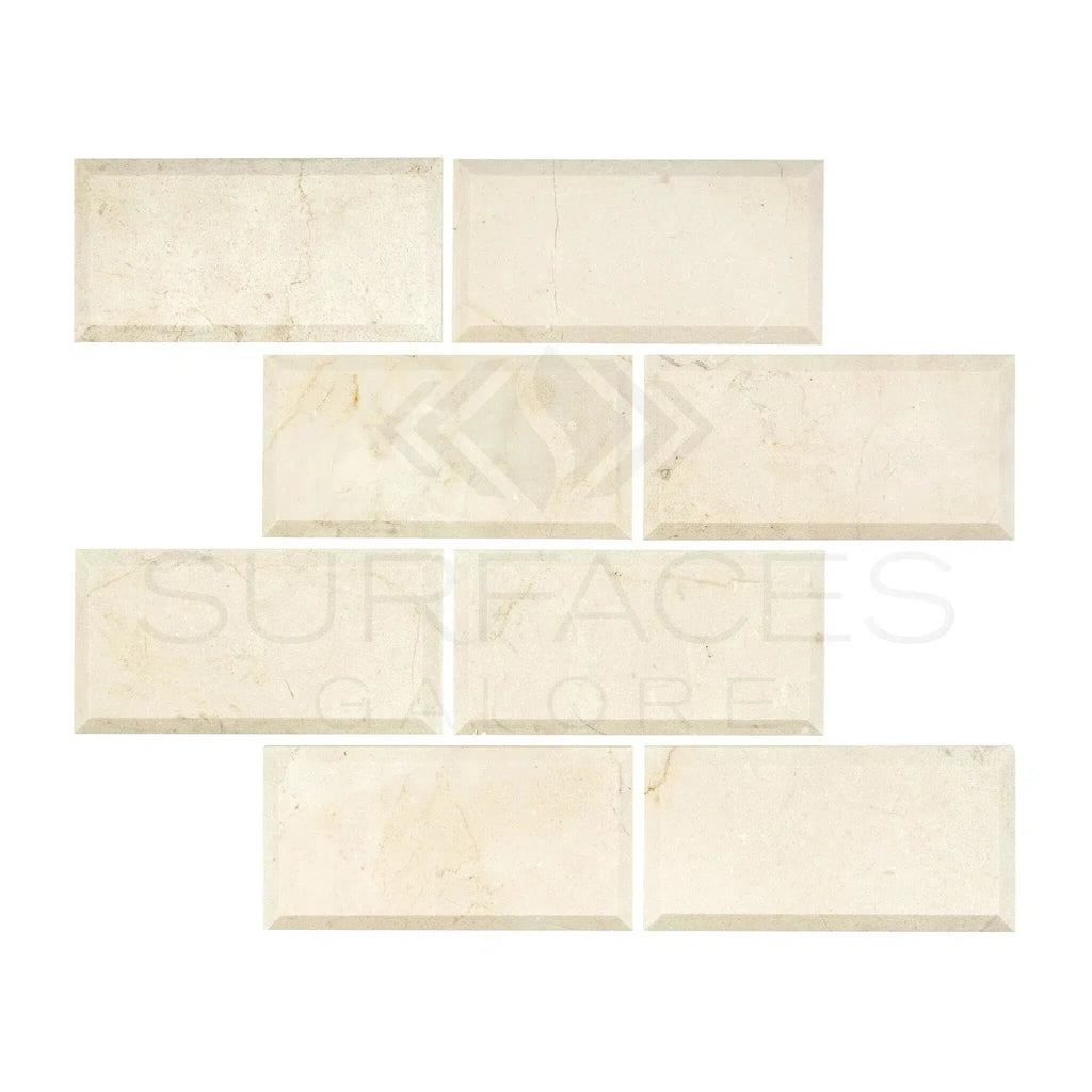 Beveled cream-colored rectangular tiles from Crema Marfil Marble 3X6 collection