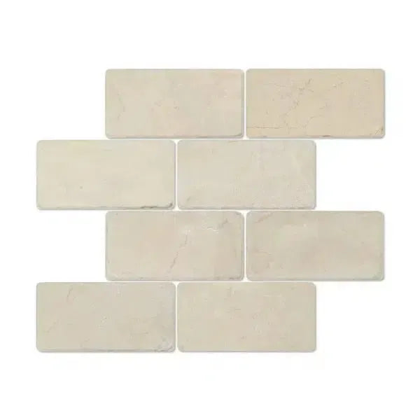 Off-white rectangular brick pattern in Crema Marfil Marble 3X6 Tumbled product