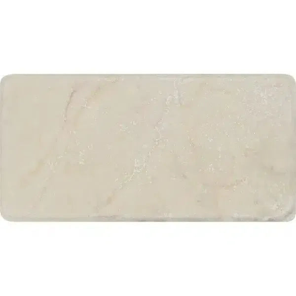 Rectangular bar of Crema Marfil Marble 3X6 Tumbled soap showcasing elegant design