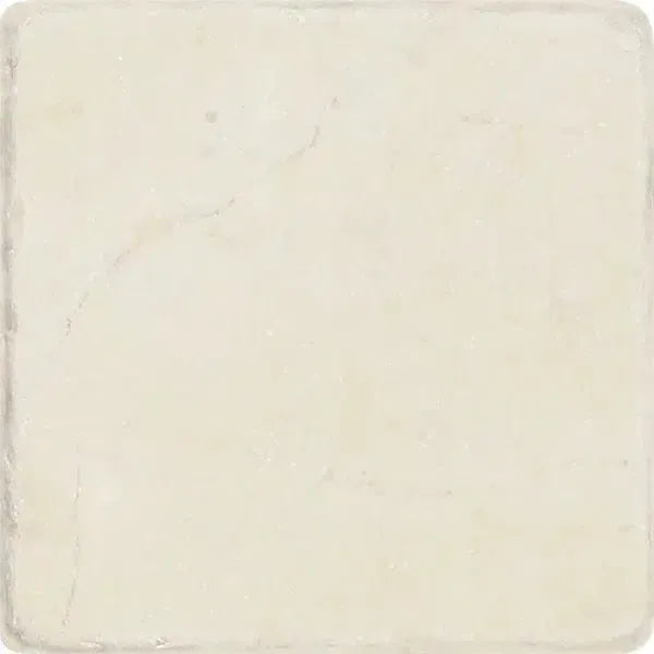 Square off-white Crema Marfil Marble 4X4 Tumbled tile for elegant interiors