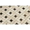 Interlocking beige and brown mosaic tiles in Crema Marfil Marble Pinwheel design