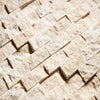 Textured beige stone wall tiles in Diano Royal Marble 1X2 Brick Mosaic Split-Faced design