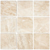 Nine beige Diano Royal Queen Beige Marble 4X4 Tumbled tiles arranged for display