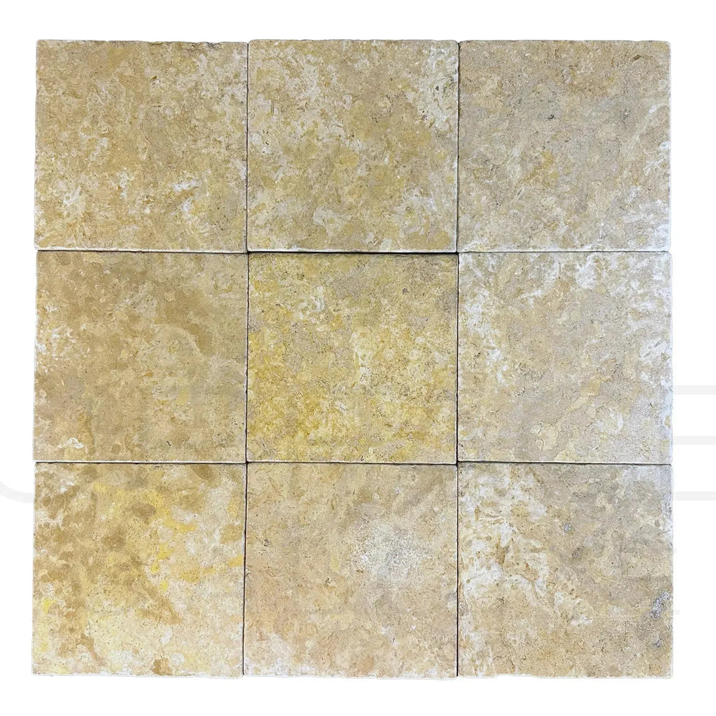 Nine square Dore Reale Light travertine tiles in golden beige for premium flooring