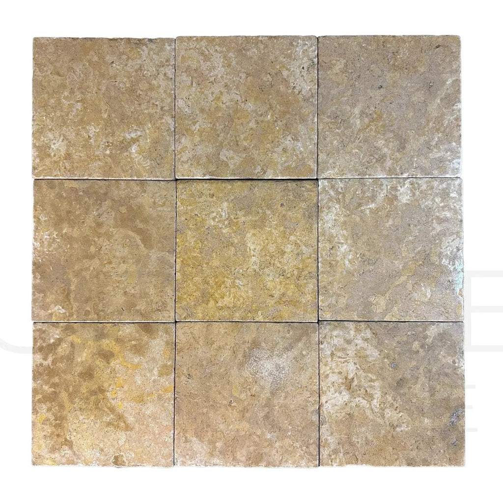 Square travertine tile arrangement of Dore Reale Light 12X12 Tumbled Tile