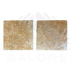 Two square Dore Reale Light travertine tiles in golden beige design