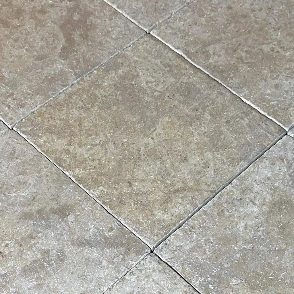 Square stone floor tiles in Dore Reale Light Golden Beige, 12X12 Tumbled Tile