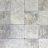 Square gray stone tiles of Dore Reale Light 6X6 Tumbled Tile for elegant decor