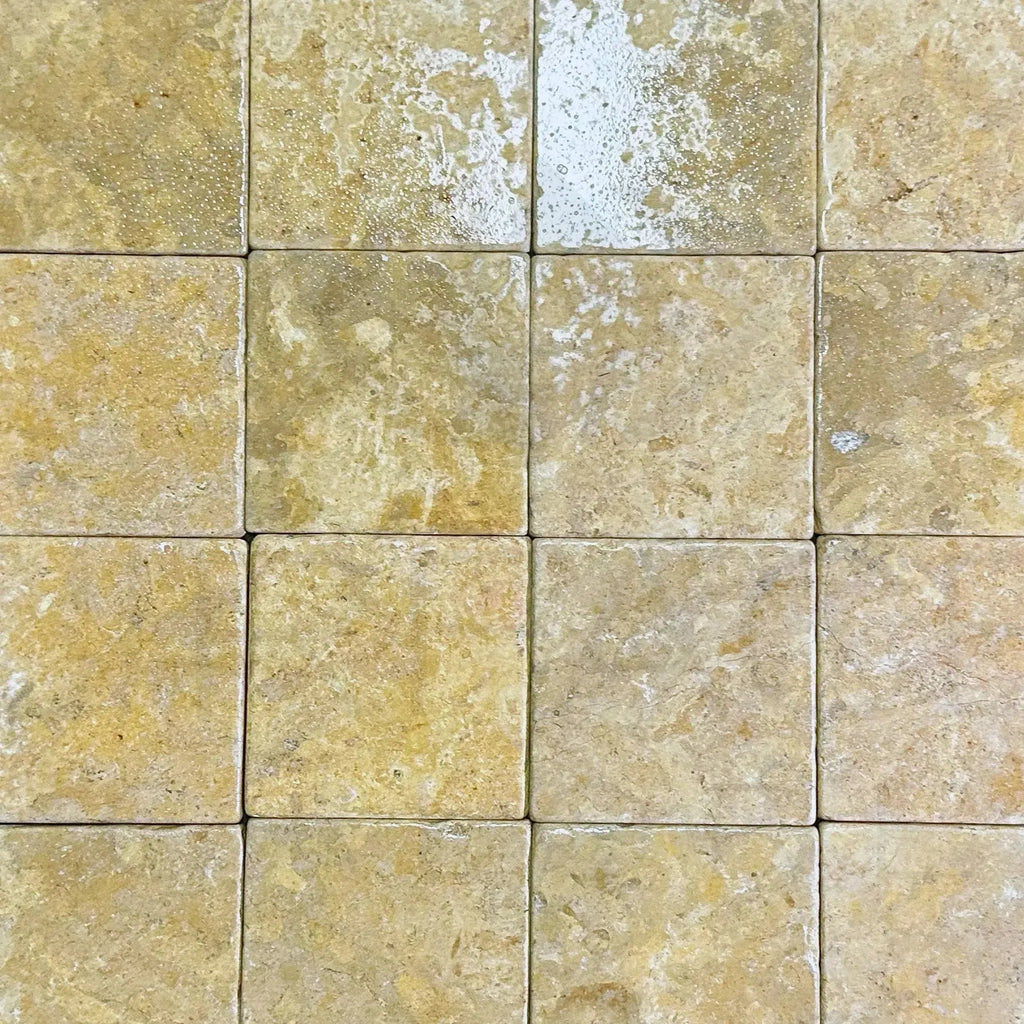 Square travertine tiles from Dore Reale Light in golden beige, 6x6 tumbled style