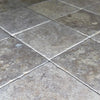 Gray tiled floor featuring Dore Reale Light (Golden Beige) 6X6 Tumbled Tile