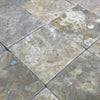 Tiled stone floor featuring Dore Reale Light Golden Beige 6X6 Tumbled Tile