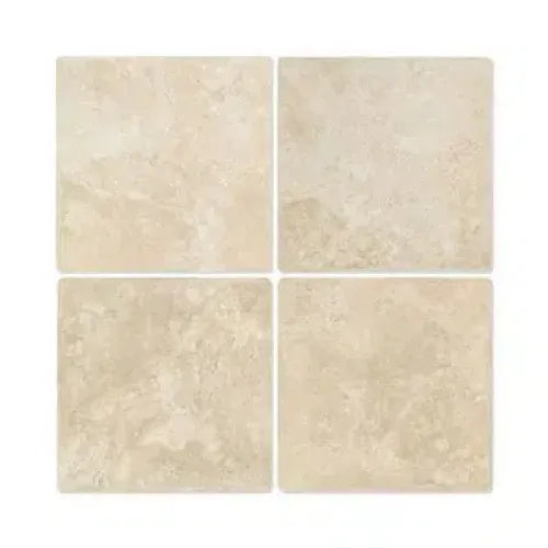 Four beige Travertine tiles from Durango/Paredon Mexican 12X12 Tumbled collection