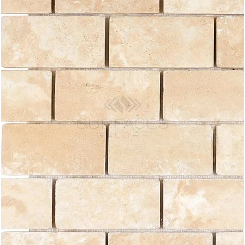 Beige brick-patterned tile from Durango/Paredon Mexican 2X4 Brick Mosaic Travertine Tumbled