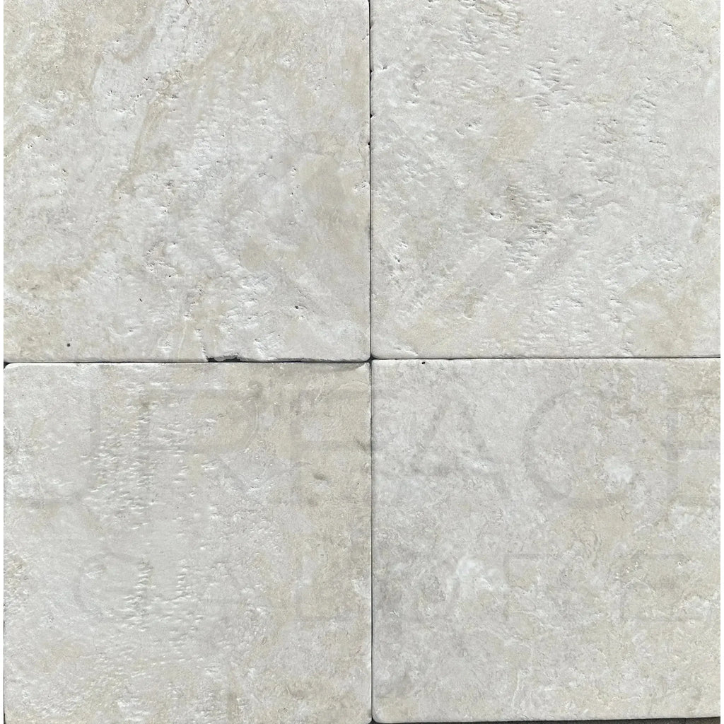 Four light-colored stone tiles from Durango Santa Fe 12X12 Tumbled Tile product