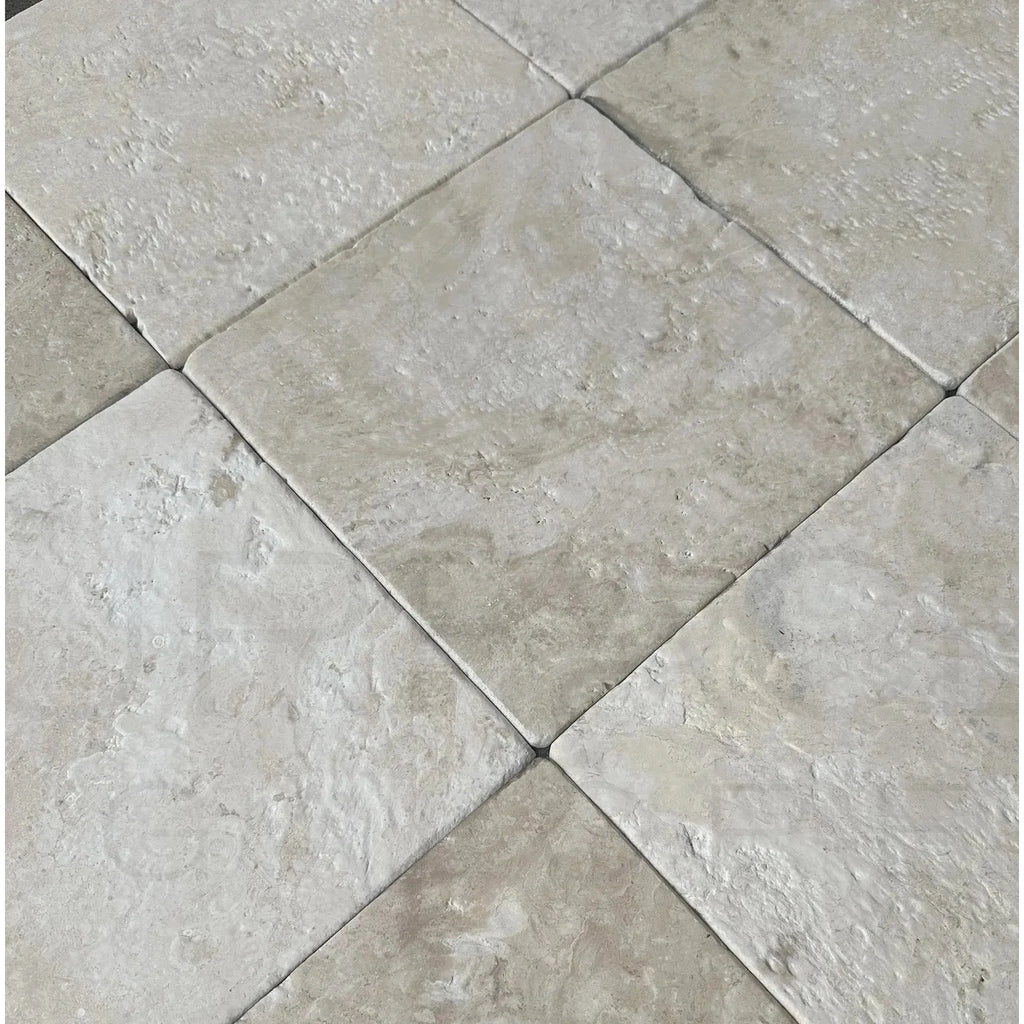 Tiled floor featuring textured surface of Durango 12X12 Tumbled Tile for $4.99/Sq.Ft