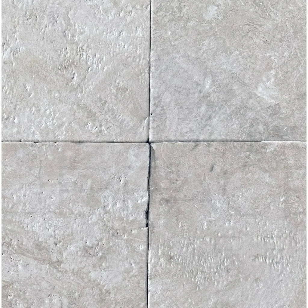 Four light gray stone tiles of Durango Santa Fe 12X12 Tumbled Tile for sale