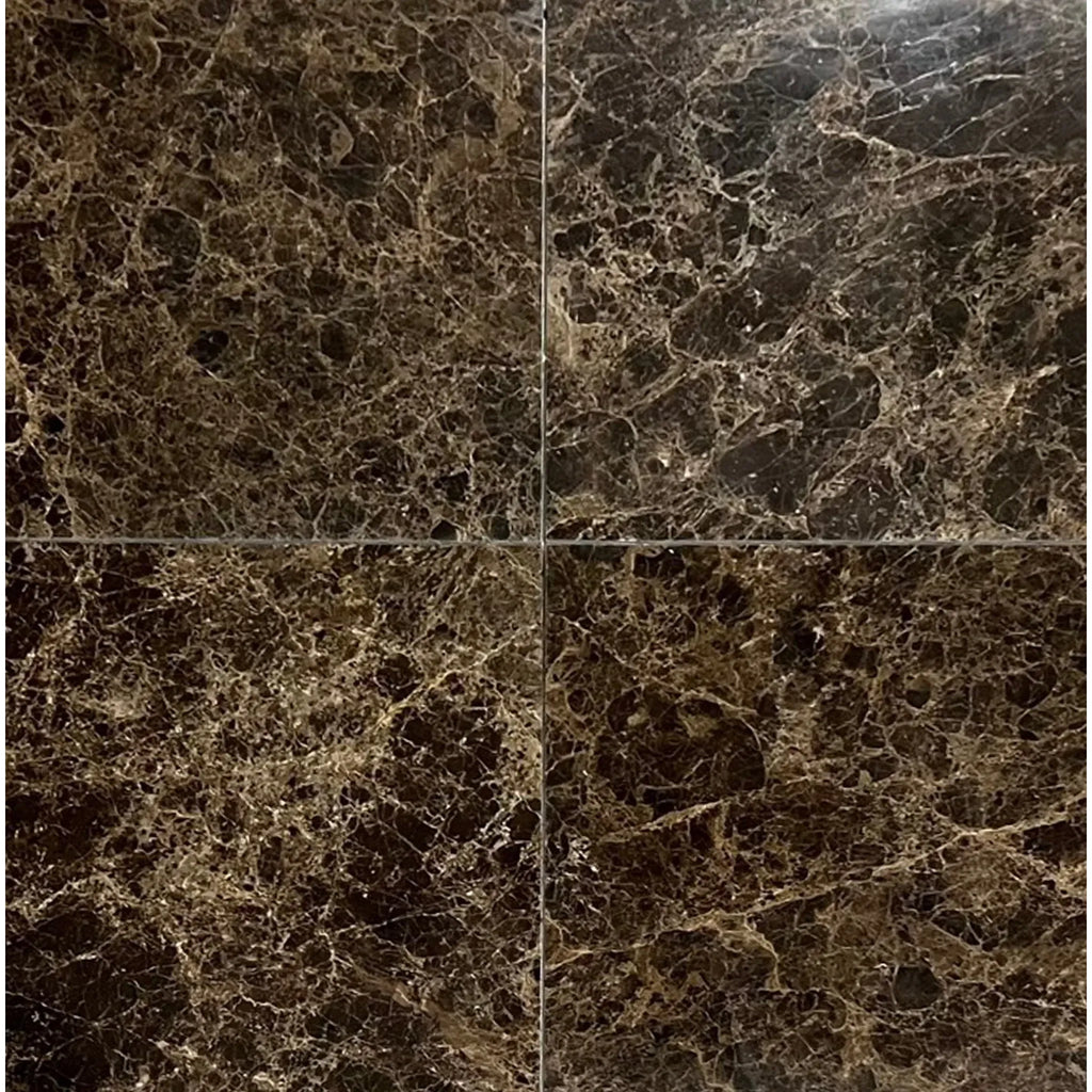 Four dark marble tiles of Emperador Dark Marble 1 Inch Hexagon Mosaic Tumbled