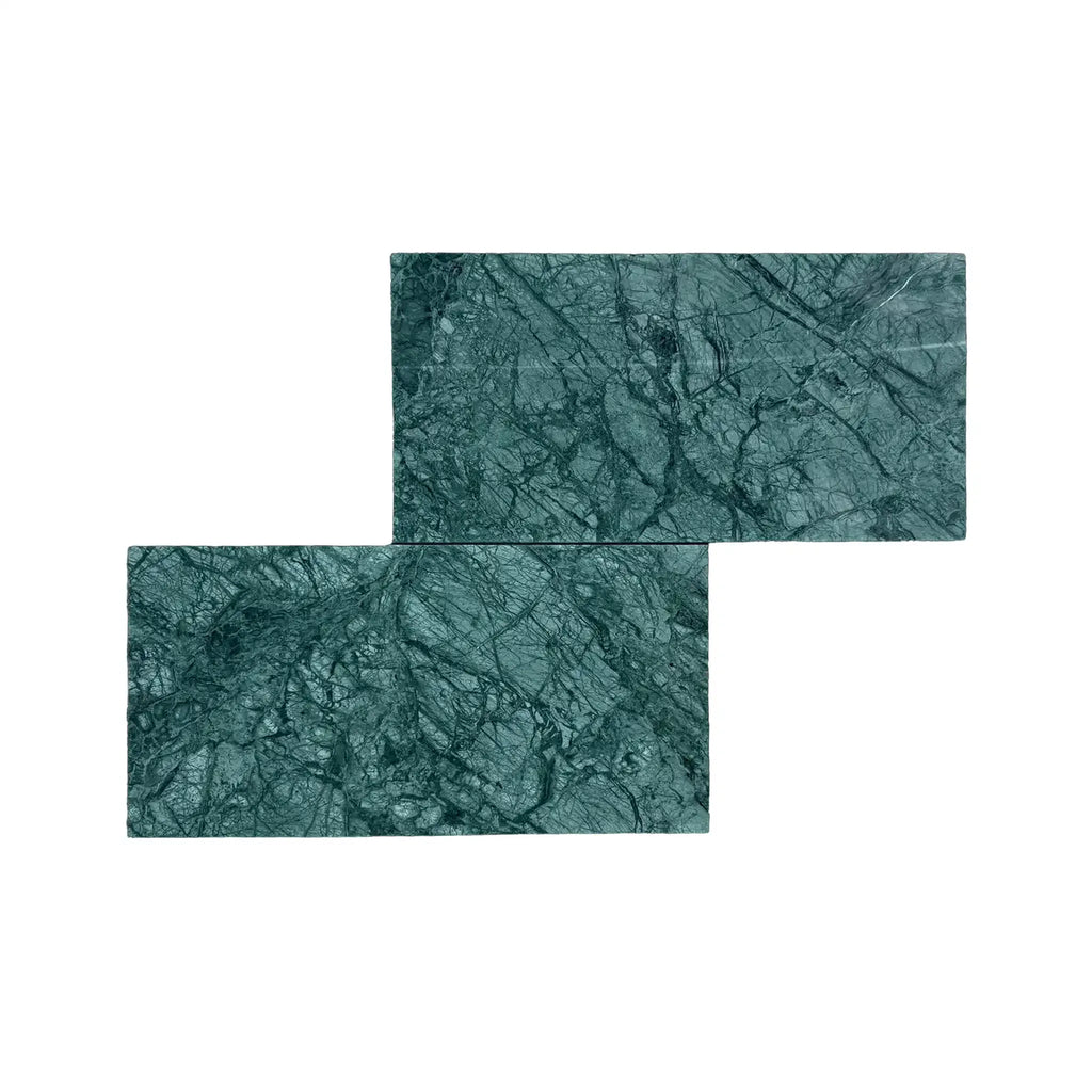 Two green marble tiles of Empress Green Marble 12X24 Polished showcasing elegance