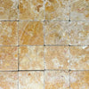 Square tan-colored Giallo Reale Marble 6X6 Tumbled Tile suitable for various designs