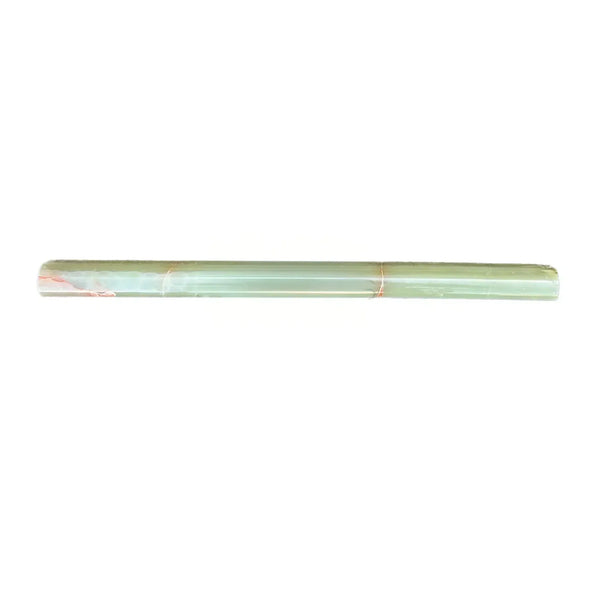 Bundle of green bamboo sticks in Green Onyx 3/4X12 Bullnose Liner Polished