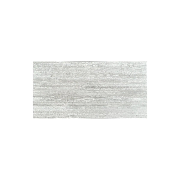 Rectangular light gray wood-look tile from Haisa Light 12X24 Limestone Honed collection