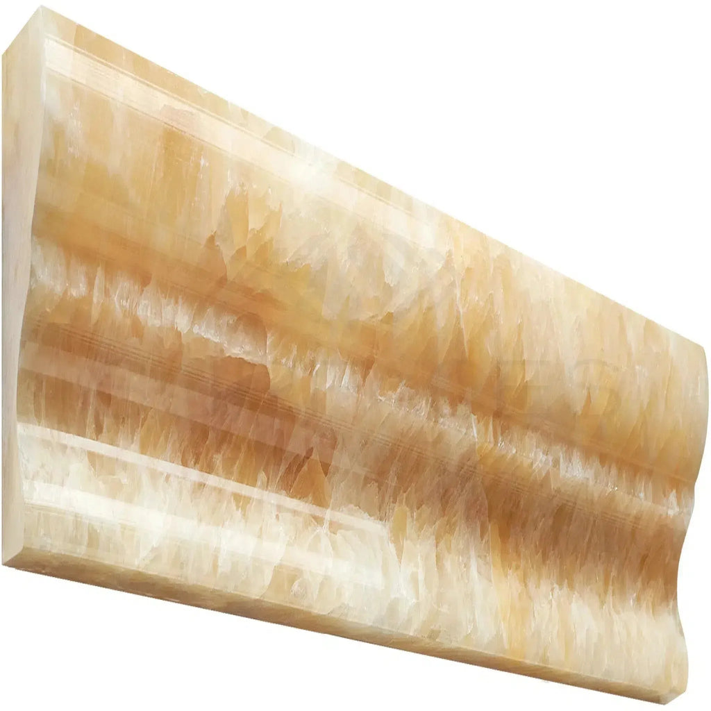 Polished yellow onyx molding in Honey Onyx Giallo Crystal 2X12 Crown Liner