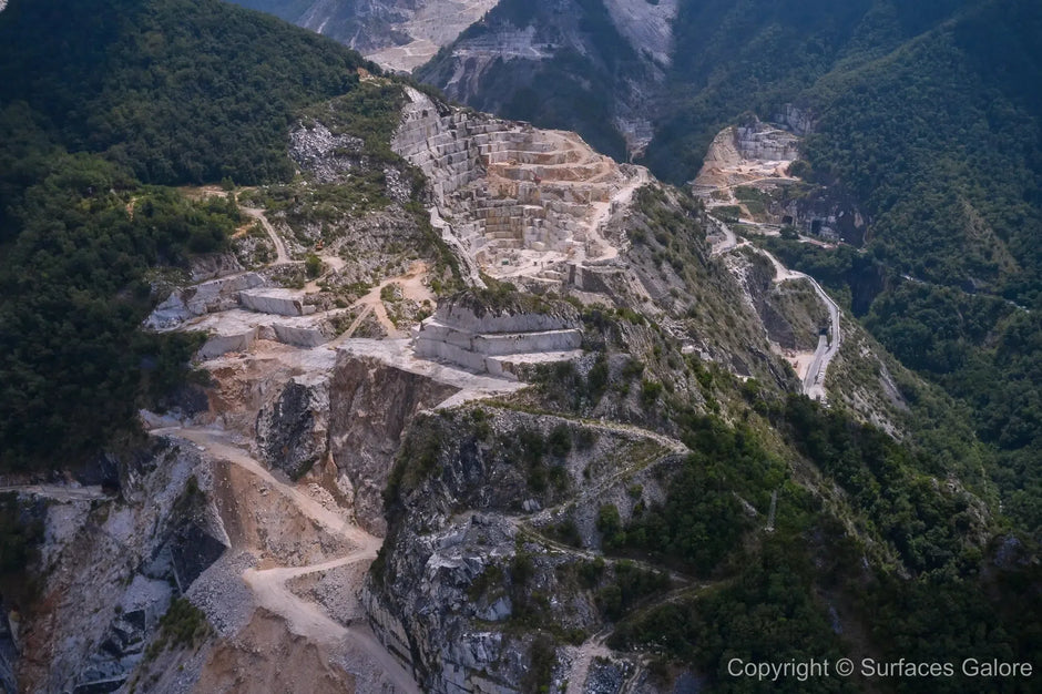 Marble stone quarry and factory showcasing the process of extracting and refining elegant natural stone surfaces for tiles.