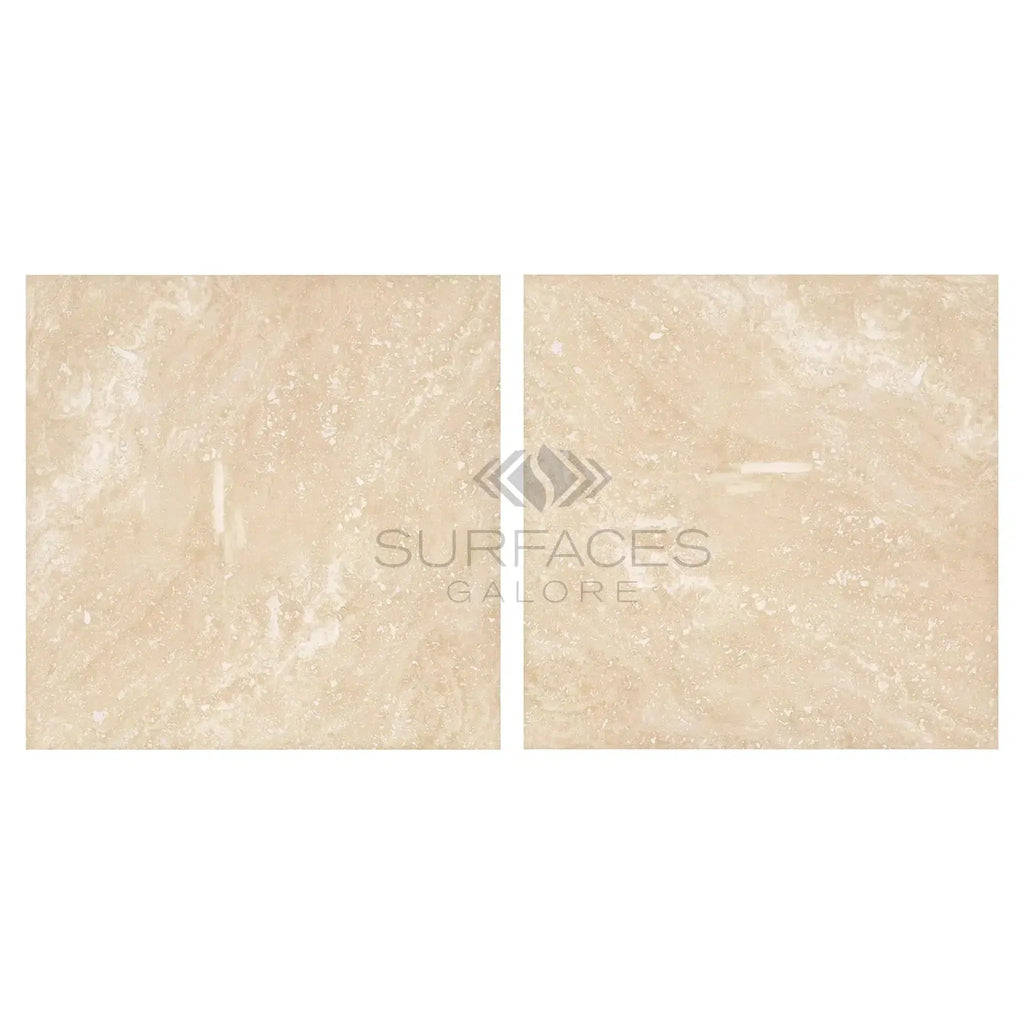 Two beige marble tiles of Ivory Light Travertine 12X12 Cross-Cut Filled and Honed