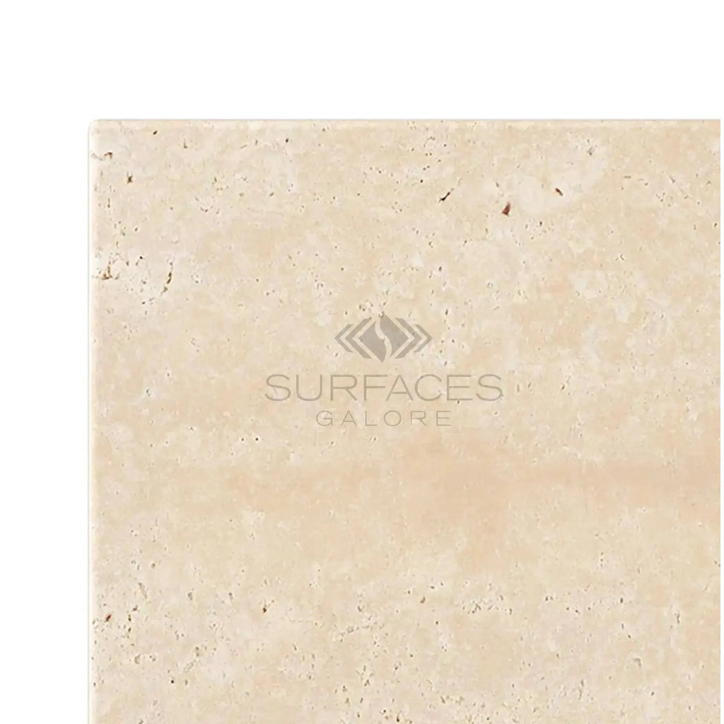 Beige travertine tile, Ivory (Light) Travertine 16x16, showcasing cross-cut tumbled finish