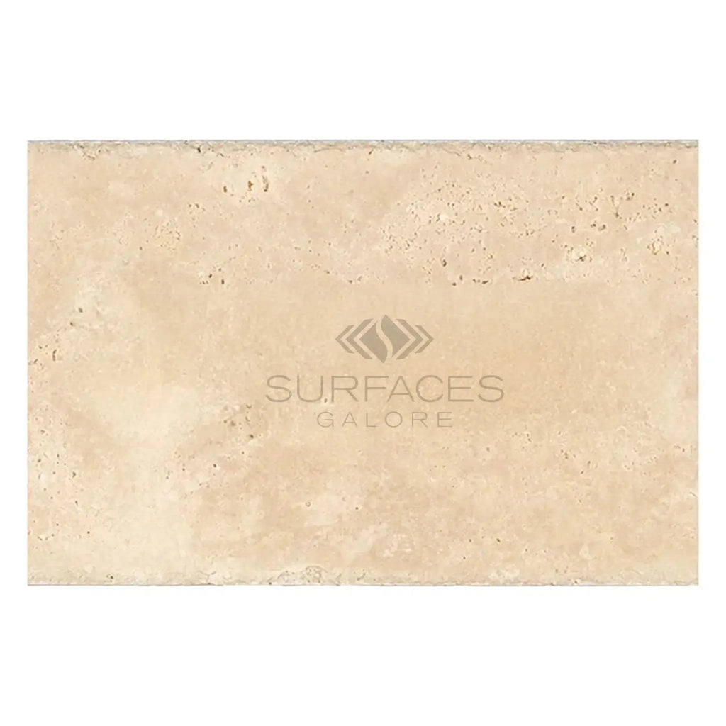 Beige travertine tile from Ivory Light Travertine 16X24 Cross-Cut Unfilled Brushed Chiseled