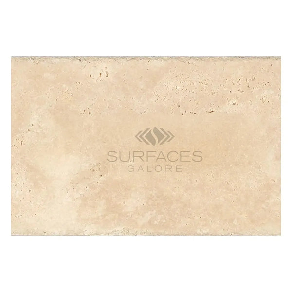 Beige travertine tile from Ivory Light Travertine 16X24 Cross-Cut Unfilled Brushed Chiseled