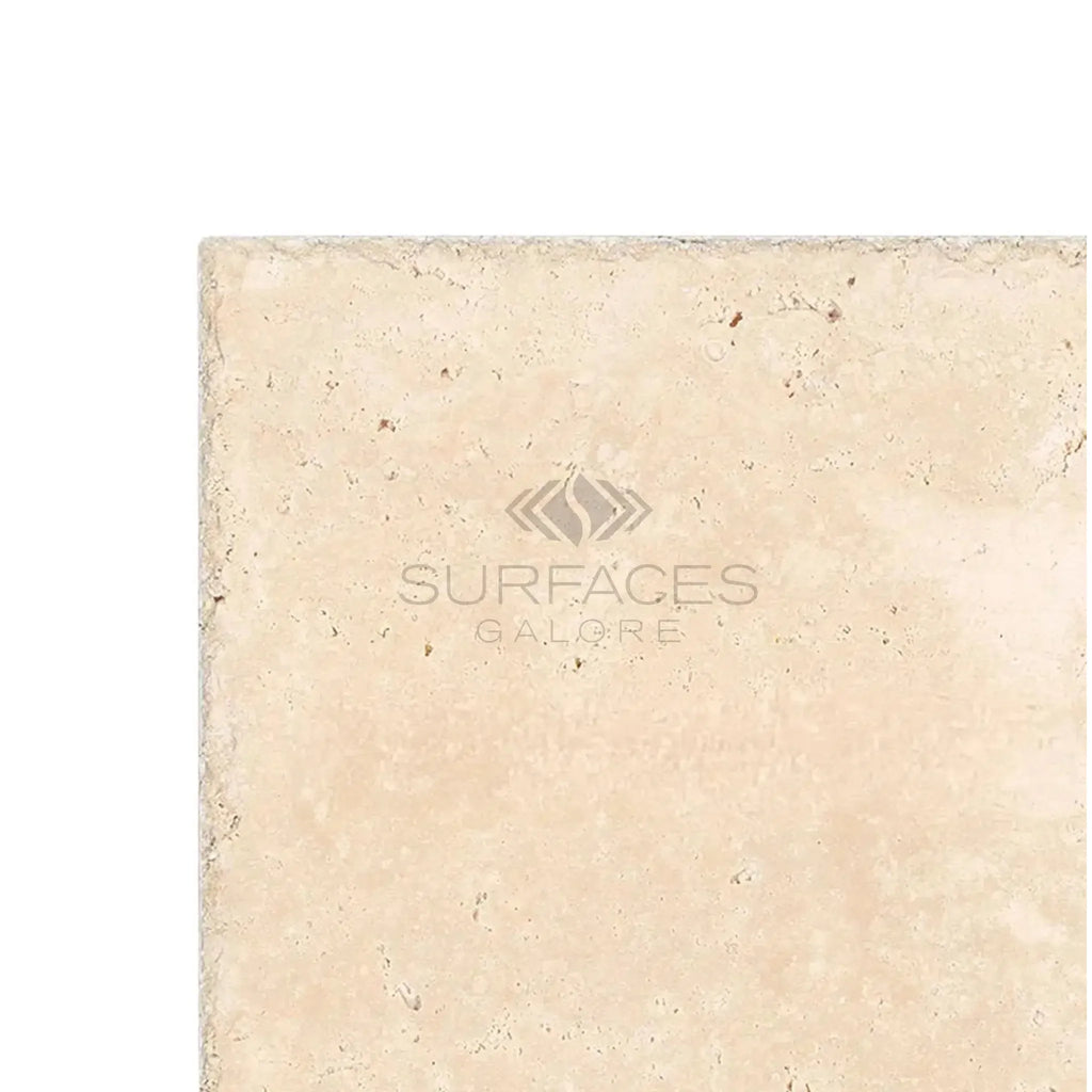 Beige travertine tile from Ivory Light Travertine 18X18 Cross-Cut Unfilled Brushed Chiseled