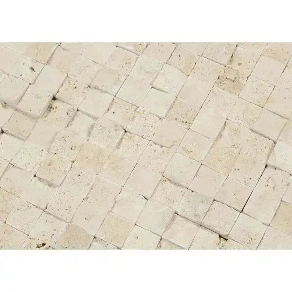 Textured beige stone tile pattern of Ivory Light Travertine 1X1 Mosaic Split-Faced