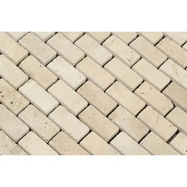 Rectangular beige brick pattern of Ivory Light Travertine 1X2 Brick Mosaic Tumbled