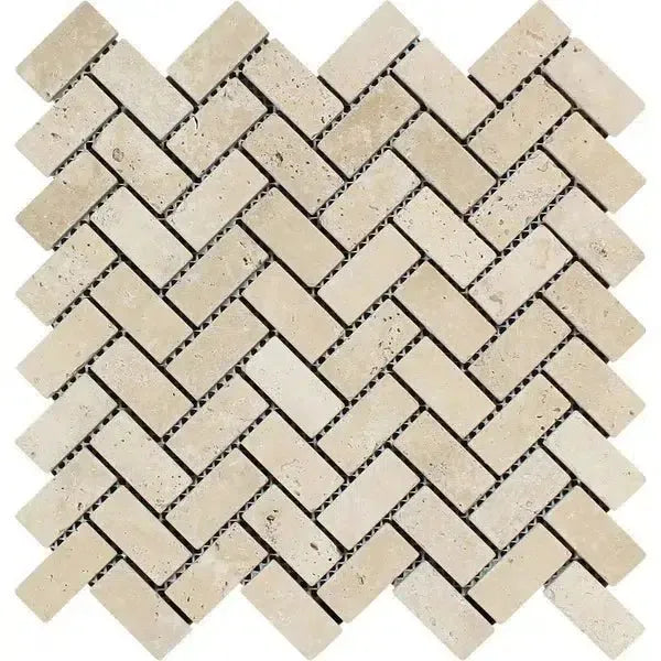 Beige stone tiles in a herringbone pattern for Ivory Light Travertine mosaic