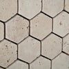 Beige hexagon travertine tiles from Ivory Light Travertine 2 inch Mosaic Tumbled collection