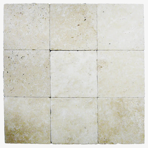 Nine square Ivory Travertine 24X24 3 cm Tumbled Paver tiles displayed together