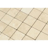 Beige square tiles in Ivory Light Travertine 2X2 Brick Mosaic Filled and Honed