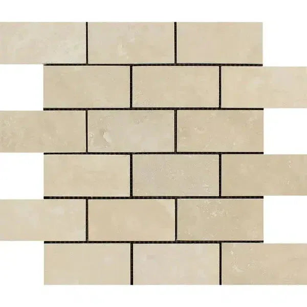 Beige brick mosaic tile from Ivory Light Travertine 2X4 Filled and Honed collection