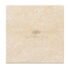 Beige travertine tile displayed in Ivory Light Travertine 4X4 Cross-Cut Tumbled design