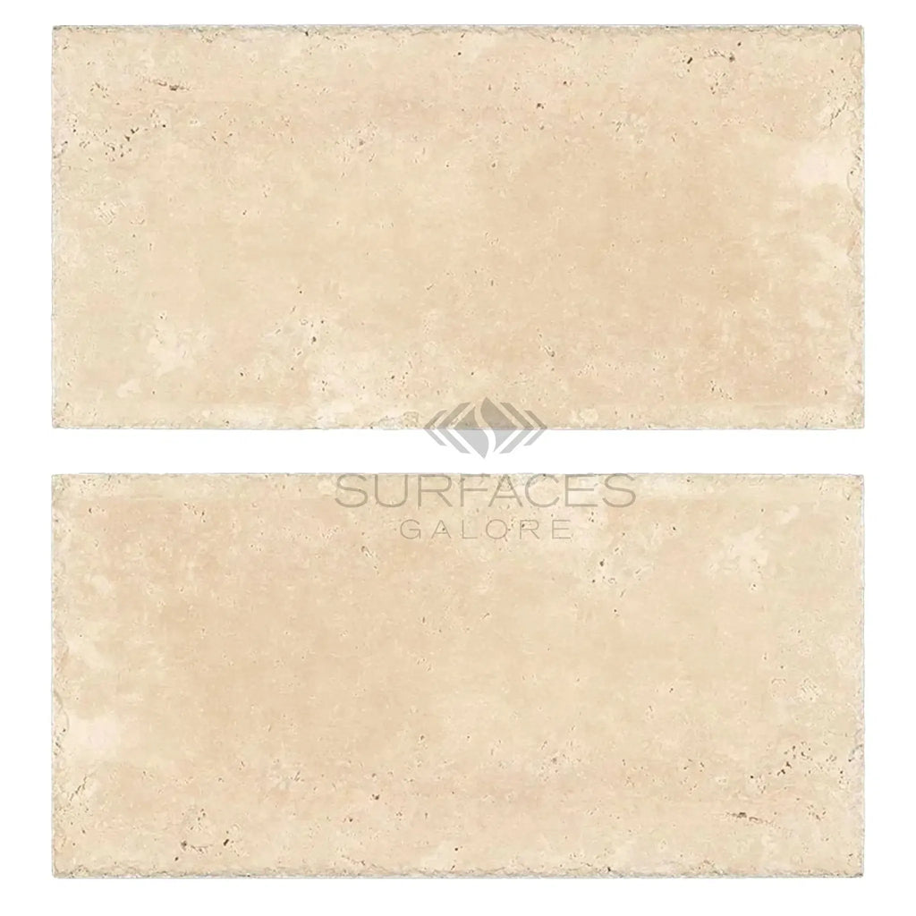 Two beige travertine tiles from the Ivory Light Travertine collection, 8X16 size