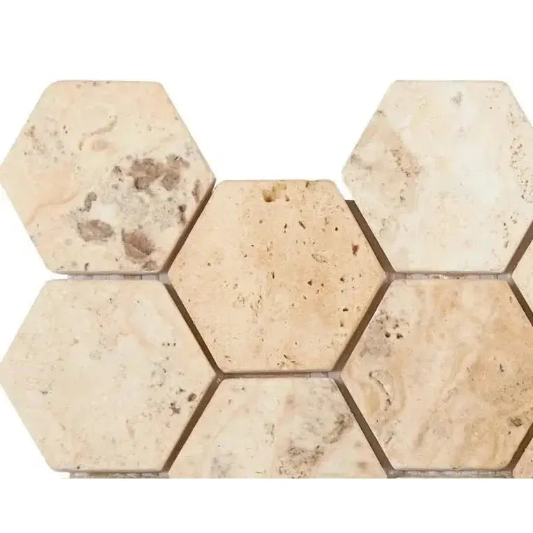 Beige hexagon travertine tiles from La Travonya Travertine 2’’ Hexagon Mosaic collection